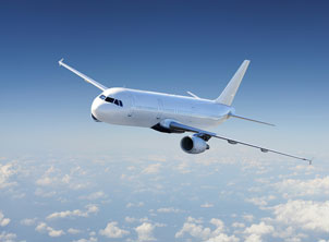 Airplane over clouds